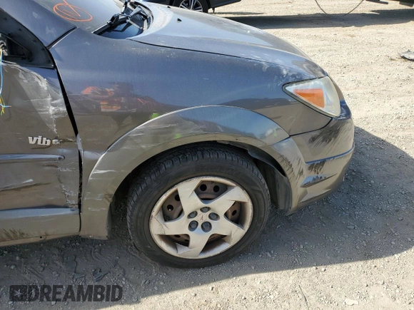2005 Pontiac Vibe z VIN 5Y2SL63855Z404970, wystawiony jako Copart lot #56750875 z przebiegiem 128 636 mil mil oraz Szkoda całkowita • Salvage title. Historia ofert i sprzedaży dostępna na DreamBid. Obrazek 12.
