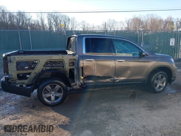 2022 Honda Ridgeline RTL-E with VIN 5FPYK3F79NB005152, listed as a IAAI auction lot 41754891 with 60,191 mi miles and . Bid and sale history available at DreamBid. Image 14.