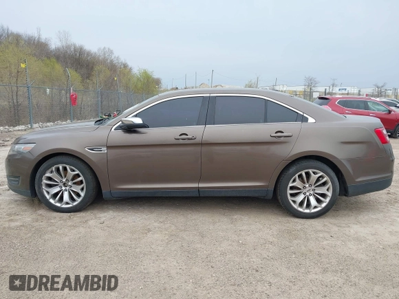 2015 Ford Taurus Limited with VIN 1FAHP2J84FG110702, listed as a IAAI auction lot 42060437 with 208,012 mi miles. Bid and sale history available at carsss.com. Image 14.