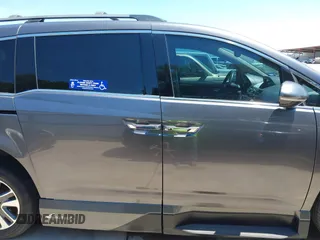2015 Honda Odyssey Touring Elite z VIN 5FNRL5H99FB017517, wystawiony jako IAAI lot #42246066 z przebiegiem 104 878 mil mil oraz . Historia ofert i sprzedaży dostępna na DreamBid. Obrazek 13.