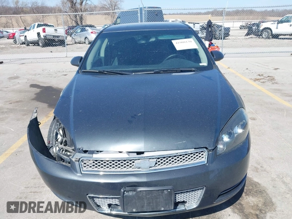 2013 Chevrolet Impala LT with VIN 2G1WB5E31D1163179, listed as a IAAI auction lot 41908130 with 190,801 mi miles and . Bid and sale history available at DreamBid. Image 12.
