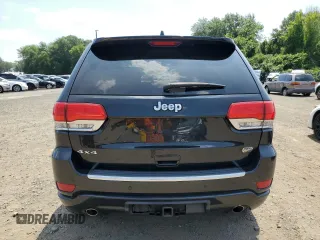 2015 Jeep Grand Cherokee Overland с VIN 1C4RJFCG4FC104420, выставлен на аукционе Copart как лот 66014955 с пробегом 165 645 миль миль и Списание • Salvage title. История ставок и продаж доступна на DreamBid. Изображение 6.
