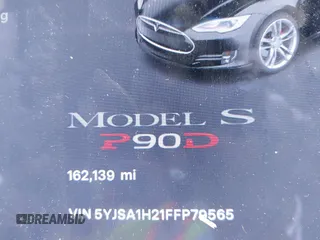 2015 Tesla Model S 85D with VIN 5YJSA1H21FFP79565, listed as a IAAI auction lot 42076401 with 162,139 mi miles. Bid and sale history available at carsss.com. Image 15.
