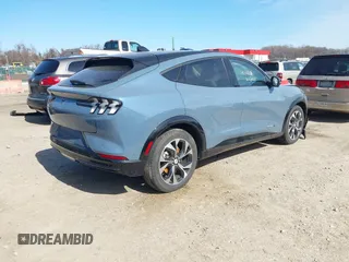2023 Ford Mustang Mach-E Premium z VIN 3FMTK3SU3PMA65341, wystawiony jako IAAI lot #41747617 z przebiegiem 3 430 mil mil oraz . Historia ofert i sprzedaży dostępna na DreamBid. Obrazek 4.