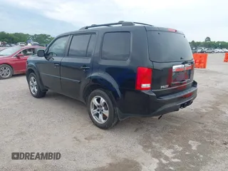 2013 Honda Pilot EX-L with VIN 5FNYF3H50DB042467, listed as a IAAI auction lot 42260597 with 165,836 mi miles and . Bid and sale history available at DreamBid. Image 3.