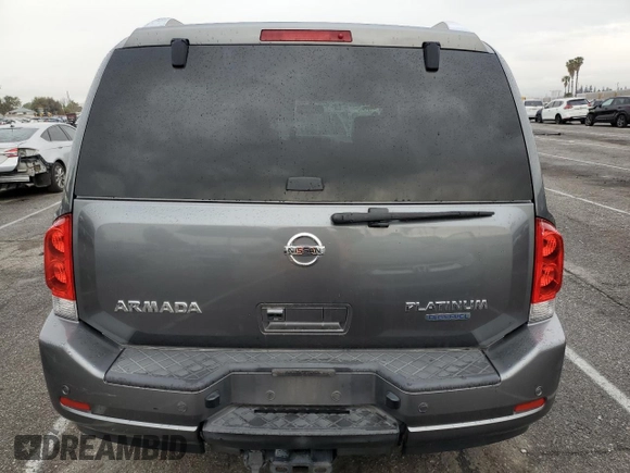 2015 Nissan Armada Platinum z VIN 5N1BA0NF6FN617932, wystawiony jako Copart lot #48202355 z przebiegiem 101 219 mil mil oraz Szkoda całkowita • Salvage title. Historia ofert i sprzedaży dostępna na DreamBid. Obrazek 6.