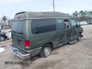 2002 Ford Econoline Passenger XL with VIN 1FMRE11L82HA83636, listed as a IAAI auction lot 41718025 with 153,581 mi miles and . Bid and sale history available at DreamBid. Image 4.