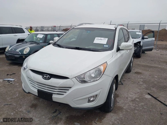 2013 Hyundai Tucson GLS with VIN KM8JU3AC2DU561443, listed as a IAAI auction lot 41600727 with 179,694 mi miles. Bid and sale history available at carsss.com. Image 6.