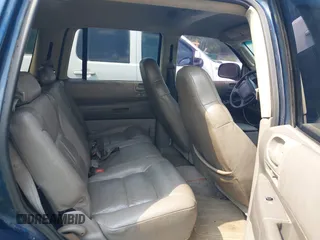 2003 Dodge Durango SLT z VIN 1D4HS48N33F540550, wystawiony jako IAAI lot #42413911 z przebiegiem 309 084 mil mil oraz . Historia ofert i sprzedaży dostępna na DreamBid. Obrazek 8.