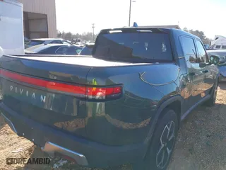 2022 Rivian R1T Adventure Package with VIN 7FCTGAAA2NN006098, listed as a IAAI auction lot 41172815 with 1 mi miles. Bid and sale history available at carsss.com. Image 4.