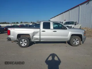 2014 Chevrolet Silverado 1500 LT with VIN 1GCVKREC0EZ162611, listed as a IAAI auction lot 41637456 with 162,637 mi miles and . Bid and sale history available at DreamBid. Image 13.