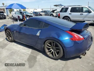 2016 Nissan 370Z z VIN JN1AZ4EH9GM933658, wystawiony jako Copart lot #48760215 z przebiegiem 70 682 mil mil oraz Szkoda całkowita • Salvage title. Historia ofert i sprzedaży dostępna na DreamBid. Obrazek 2.