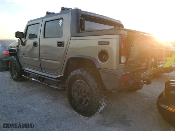 2005 Hummer H2 SUT with VIN 5GRGN22U05H116639, listed as a Copart auction lot 75496634 with 106,012 mi miles and Non Repairable. Bid and sale history available at carsss.com. Image 2.
