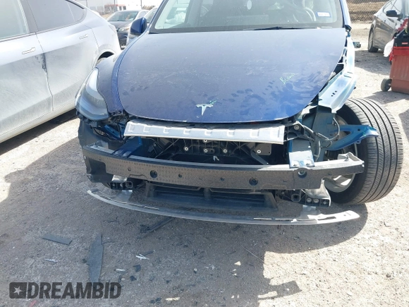 2024 Tesla Model Y Long Range with VIN 7SAYGDEE4RA247417, listed as a IAAI auction lot 41735632 with 30,062 mi miles. Bid and sale history available at carsss.com. Image 6.