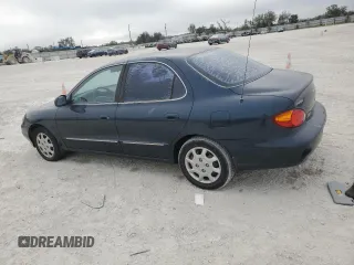 2000 Hyundai Elantra GLS z VIN KMHJF35F9YU032902, wystawiony jako Copart lot #45145955 z przebiegiem 79 229 mil mil oraz Czysty tytuł • Clean title. Historia ofert i sprzedaży dostępna na DreamBid. Obrazek 2.