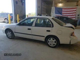 1999 Chevrolet Prizm z VIN 1Y1SK5281XZ429846, wystawiony jako Copart lot #56907955 z przebiegiem 90 581 mil mil oraz Szkoda całkowita • Salvage title. Historia ofert i sprzedaży dostępna na DreamBid. Obrazek 2.