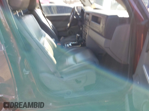 2007 Jeep Commander Sport z VIN 1J8HG48P37C573256, wystawiony jako IAAI lot #41448883 z przebiegiem 146 581 mil mil oraz . Historia ofert i sprzedaży dostępna na DreamBid. Obrazek 5.