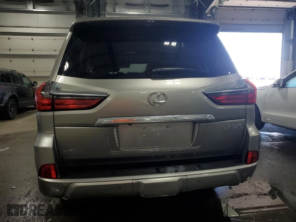 2018 Lexus LX 570 with VIN JTJHY7AX6J4261835, listed as a Copart auction lot 55998945 with 99,673 mi miles and Salvage title. Bid and sale history available at DreamBid. Image 6.