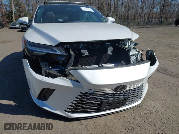 2023 Lexus RX 350 z VIN 2T2BAMCA7PC030674, wystawiony jako IAAI lot #41675352 z przebiegiem 13 337 mil mil oraz . Historia ofert i sprzedaży dostępna na DreamBid. Obrazek 12.