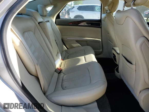 2015 Lincoln MKZ z VIN 3LN6L2G95FR603693, wystawiony jako Copart lot #53362845 z przebiegiem 171 107 mil mil oraz Szkoda całkowita • Salvage title. Historia ofert i sprzedaży dostępna na DreamBid. Obrazek 10.