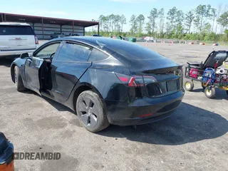 2023 Tesla Model 3 with VIN 5YJ3E1EA3PF681515, listed as a IAAI auction lot 41899053 with 15,985 mi miles and . Bid and sale history available at carsss.com. Image 3.