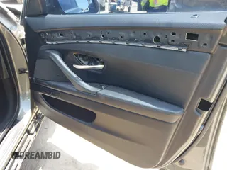 2014 BMW 5 Series 535i xDrive with VIN WBA5B3C57ED531072, listed as a IAAI auction lot 42574991 with 104,304 mi miles and . Bid and sale history available at DreamBid. Image 18.