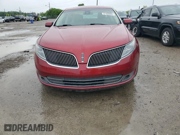 2013 Lincoln MKS EcoBoost with VIN 1LNHL9FTXDG606799, listed as a Copart auction lot 57469995 with 80,168 mi miles and Salvage title. Bid and sale history available at DreamBid. Image 5.