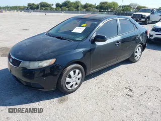 2012 Kia Forte EX with VIN KNAFU4A22C5493299, listed as a IAAI auction lot 41784831 with 218,479 mi miles. Bid and sale history available at carsss.com. Image 2.