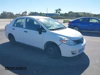 2010 Nissan Versa 1.6 with VIN 3N1CC1AP2AL377412, listed as a IAAI auction lot 41420948 with 127,643 mi miles. Bid and sale history available at carsss.com. Image 1.