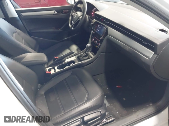 2021 Volkswagen Passat SE with VIN 1VWSA7A30MC014179, listed as a IAAI auction lot 42342358 with 77,535 mi miles and . Bid and sale history available at DreamBid. Image 5.