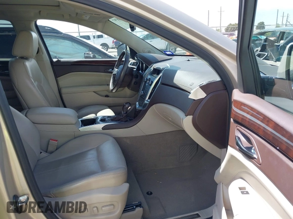 2011 Cadillac SRX Luxury Collection with VIN 3GYFNAEY7BS673549, listed as a IAAI auction lot 42068397 with 71,092 mi miles and . Bid and sale history available at DreamBid. Image 5.