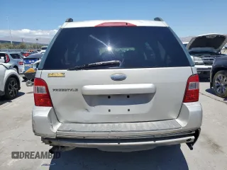 2006 Ford Freestyle SE z VIN 1FMZK01136GA36883, wystawiony jako Copart lot #56223985 z przebiegiem 156 885 mil mil oraz Szkody całkowita. Historia ofert i sprzedaży dostępna na DreamBid. Obrazek 6.