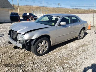 2005 Chrysler 300 Touring AWD with VIN 2C3JK53GX5H624772, listed as a Copart auction lot 50814845 with 119,115 mi miles and Salvage Title. Bid and sale history available at DreamBid. Image 1.