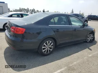 2013 Volkswagen Jetta SE with VIN 3VWDX7AJ6DM438180, listed as a Copart auction lot 59582655 with 106,082 mi miles and Salvage title. Bid and sale history available at DreamBid. Image 3.