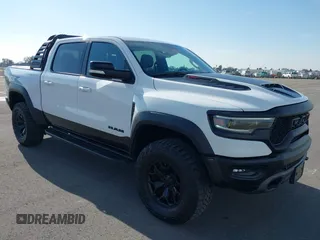 2022 Ram 1500 TRX with VIN 1C6SRFU93NN217358, listed as a IAAI auction lot 41304004 with 18,783 mi miles and . Bid and sale history available at DreamBid. Image 1.