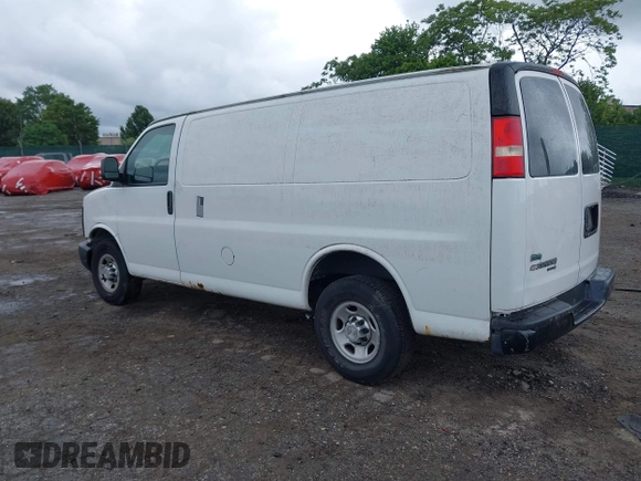2012 Chevrolet Express Cargo with VIN 1GCWGFFA8C1108597, listed as a IAAI auction lot 42323808 with 200,965 mi miles and . Bid and sale history available at DreamBid. Image 3.