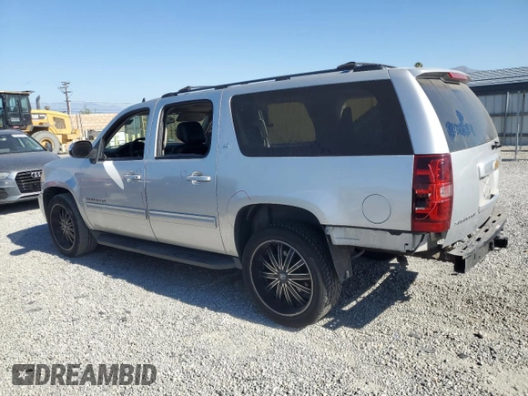 2013 Chevrolet Suburban LT with VIN 1GNSCJE05DR371789, listed as a Copart auction lot 60755775 with 233,275 mi miles and Salvage title. Bid and sale history available at DreamBid. Image 2.