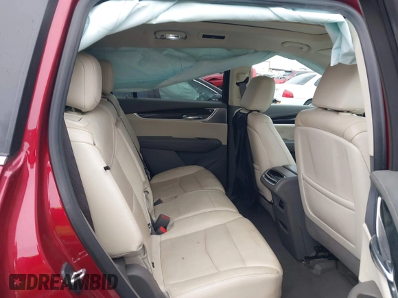 2020 Cadillac XT6 FWD Premium Luxury with VIN 1GYKPCRSXLZ133207, listed as a IAAI auction lot 41733269 with 82,853 mi miles and . Bid and sale history available at DreamBid. Image 8.