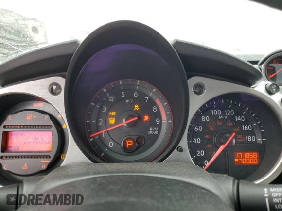 2014 Nissan 370Z Nismo z VIN JN1AZ4EH0EM634461, wystawiony jako Copart lot #53375685 z przebiegiem 171 858 mil mil oraz Szkoda całkowita • Salvage title. Historia ofert i sprzedaży dostępna na DreamBid. Obrazek 9.