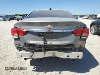 2018 Chevrolet Impala Premier with VIN 2G1125S3XJ9135697, listed as a Copart auction lot 52821965 with 122,546 mi miles and Salvage Title. Bid and sale history available at DreamBid. Image 6.
