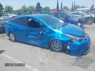 2021 Toyota Prius L Eco with VIN JTDKAMFUXM3134462, listed as a IAAI auction lot 42450931 with 89,239 mi miles and . Bid and sale history available at DreamBid. Image 13.