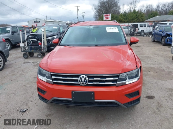 2018 Volkswagen Tiguan S with VIN 3VV0B7AX4JM124500, listed as a IAAI auction lot 41974671 with 76,970 mi miles and . Bid and sale history available at DreamBid. Image 12.