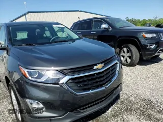 2021 Chevrolet Equinox LS z VIN 2GNAXHEV5M6144649, wystawiony jako Copart lot #54565055 z przebiegiem 61 987 mil mil oraz Szkoda całkowita • Salvage title. Historia ofert i sprzedaży dostępna na DreamBid. Obrazek 14.