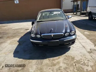 2008 Jaguar X-Type z VIN SAJWA51A38WJ36788, wystawiony jako Copart lot #73103604 z przebiegiem 192 416 mil mil oraz Szkoda całkowita • Salvage title. Historia ofert i sprzedaży dostępna na DreamBid. Obrazek 11.