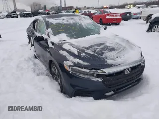 2020 Honda Insight EX with VIN 19XZE4F5XLE008024, listed as a IAAI auction lot 41259331 with 55,575 mi miles and . Bid and sale history available at carsss.com. Image 1.