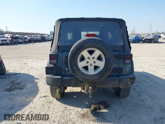 2014 Jeep Wrangler Sport with VIN 1C4AJWAG5EL271318, listed as a IAAI auction lot 41780040 with 128,942 mi miles and . Bid and sale history available at DreamBid. Image 16.