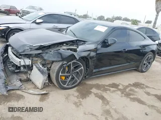 2023 Audi RS e-tron GT z VIN WAUBHBFWXP7903361, wystawiony jako IAAI lot #40585681 z przebiegiem 16 816 mil mil oraz . Historia ofert i sprzedaży dostępna na DreamBid. Obrazek 2.