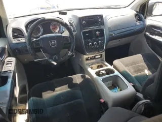 2014 Dodge Grand Caravan SXT z VIN 2C4RDGCG8ER428893, wystawiony jako Copart lot #56671355 z przebiegiem 261 815 mil mil oraz Szkoda całkowita • Salvage title. Historia ofert i sprzedaży dostępna na DreamBid. Obrazek 8.