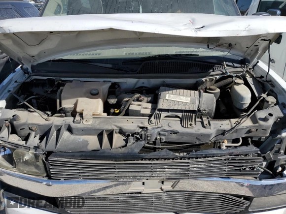 2007 Chevrolet Express Passenger z VIN 1GBFG15T471230597, wystawiony jako Copart lot #46646695 z przebiegiem 154 251 mil mil oraz Szkoda całkowita • Salvage title. Historia ofert i sprzedaży dostępna na DreamBid. Obrazek 12.