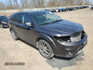 2014 Dodge Journey R/T z VIN 3C4PDCEG6ET247267, wystawiony jako Copart lot #54131685 z przebiegiem 131 811 mil mil oraz Czysty tytuł • Clean title. Historia ofert i sprzedaży dostępna na DreamBid. Obrazek 4.